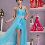 Short ceremony dress with long skirt in transparent tulle, straight neckline, skirt with openings and many glittering decorations