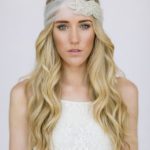 Beautiful headband to decorate the bride's loose hair in tulle with sparkling stones decorations
