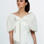 Faux fur wedding cape with satin ribbon. Suitable on a wedding or ceremony dress.