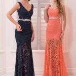 Elegant cerimony dress with V-neck and straps made in lace with rhinestone belt