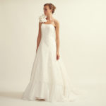 A-line wedding dress with sweetheart neckline made of lace and one shoulder organza