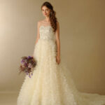 A-line wedding dress with sweetheart neckline in organza lace and satin.