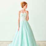 Light blue colored wedding dress with sweetheart neckline made of organza and lace