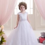 Low cost formal dresses for little girls made in satin and tulle with V neckline and satin embroidered belt
