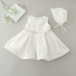 Classic baby girl baptism dress with white lace cap with sparkling stone belt and decorative bow