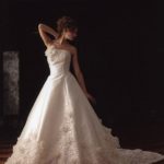 Long train wedding dress for church wedding made in satin with many lace and beading appliques
