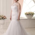 Plus-size mermaid-style wedding dress with removable transparent tulle bodice with an American neckline