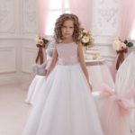 Little girl bridesmaid dress at a cheap price made of satin and tulle with a bodice decorated with many sparkling stones