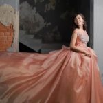 Cheap online peach pink wedding dress with boat neckline and short sleeves made of organza, satin and tulle