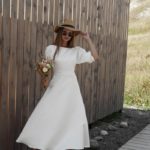 Short online wedding dress made in high-necked taffeta with three-quarter sleeves