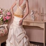 Ravenna wedding dresses, Mermaid wedding dress in ivory and champagne color made in taffeta with side draped bodice