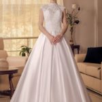 A-line high-necked wedding dress with lace bodice and clean-cut satin full skirt