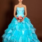 Princess-style blue wedding and ceremony dress made of organza with lace appliqués
