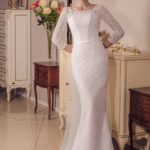 Haute couture wedding dress 2021 collection made in rebrode lace with three-quarter sleeves, illusion neckline