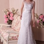 Elegant wedding dress for sale online at a cheap price in mermaid style made in lace and satin with illusion neckline
