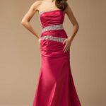 Fuchsia long ball gown for special occasions with a straight neckline, draped bust