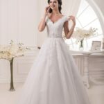 Traditional and contemporary Italy A line wedding dress from the 2021 collection in tulle with lace appliqués and satin lining