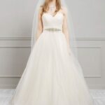 Classic wedding dress trends 2021 very simple with draped bodice, sweetheart neckline and wide tulle skirt