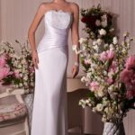 Cheap wedding dress from Novara, flared style made in satin and chiffon with strapless neckline decorated with rhinestones and pearls