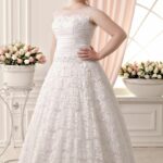 Romantic plus size wedding dress at a cheap price made in satin, lace and tulle with A line sparkly beaded appliqués