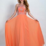Abito da cerimonia grandi firme Sposamore ON LINE colore arancione fatto in chiffon con scollo halter
