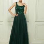 Forest green long dress with straps and bodice decorated with many lights, tulle skirt