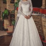 Lace wedding dress for winter wedding with long sleeves and A line skirt