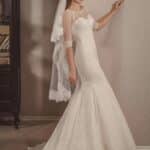 Vestido de novia en encaje siciliano con medias mangas transparentes estilo sirena muy elegante