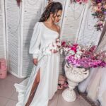 Nuevas tendencias nupciales de otoño de 2021, vestido con exquisitas inserciones de encaje y un impresionante escote de un solo hombro